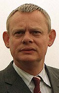 Full Martin Clunes filmography who acted in the movie The Ballad of Kid Divine: The Cockney Cowboy.