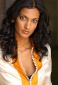 Full Poorna Jagannathan filmography who acted in the movie Mile 22.