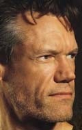 Full Randy Travis filmography who acted in the movie Outlaws: The Legend of O.B. Taggart.
