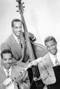 Full The King Cole Trio filmography who acted in the movie Swing in the Saddle.