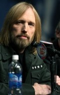 Full Tom Petty filmography who acted in the movie The Postman.