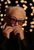 Full Toots Thielemans filmography who acted in the movie Christmas in Paris.