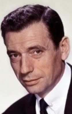 Full Yves Montand filmography who acted in the movie Un soir, un train.