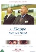 Movies At klappe med een hand poster